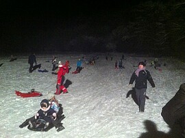 Banner Flutlichtschlittenfahren